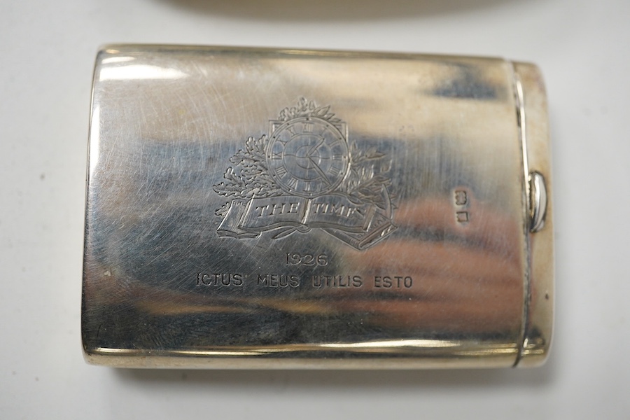 A George III silver concave snuff box by Joseph Wilmore, Birmingham, 1810, 76mm and a later George V silver snuff box, engraved 'The Times', London, 1926. Condition - fair to good